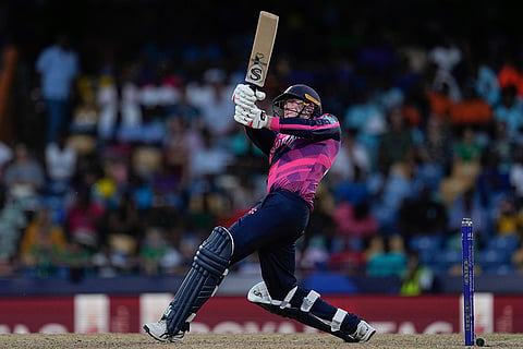 Michael Leask hits a six against Namibia